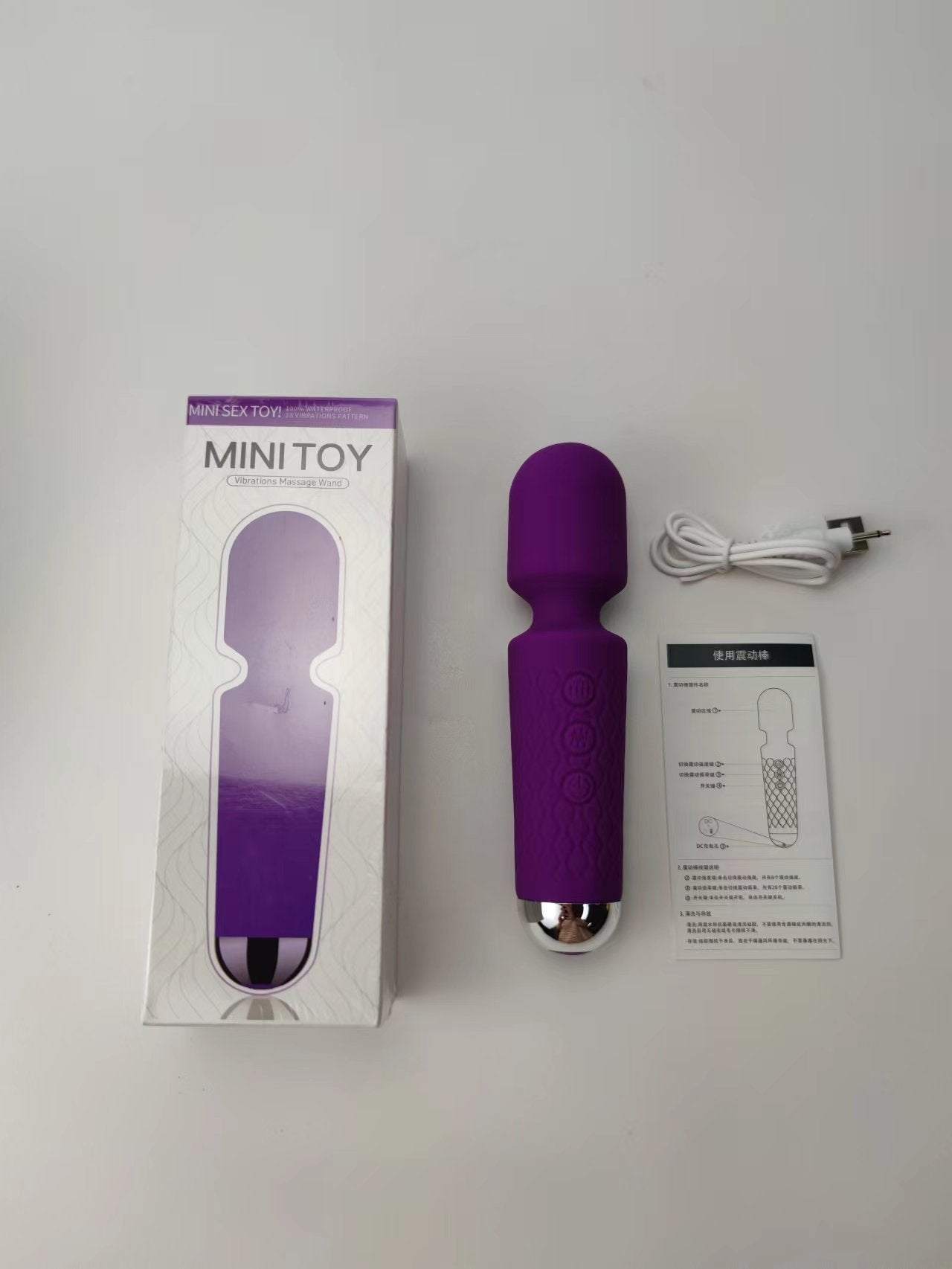 Dive deep into the world of pleasure with this sultry purple mini vibrator, elegantly showcased beside its box and a USB charger. The packaging tempts with a glimpse into the thrilling vibrations this compact sex toy promises, designed for discreet yet powerful encounters. Perfect for those secret, wild adventures anytime, anywhere.