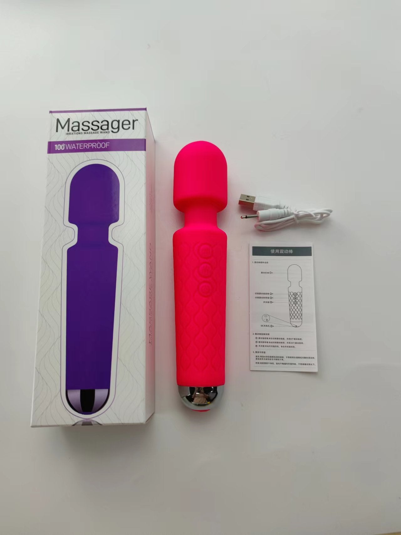 Unveil the thrill with this dark and mysterious black vibrator, displayed alongside its packaging and a USB charging cable. The box promises 100% waterproof pleasure, ensuring that this enticing toy is ready for some steamy adventures. The design is detailed with a textured grip for enhanced handling, making every touch intensely satisfying.